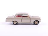 a toy car that is sitting on a white surface