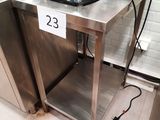 an image of a coffee maker on a table in a kitchen