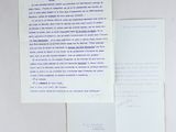 a piece of paper that has a letter on it