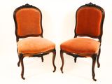 pair of chairs with orange upholstered upholstered upholstered upholstered upholstered upholstered upholstered upholstered upholstered