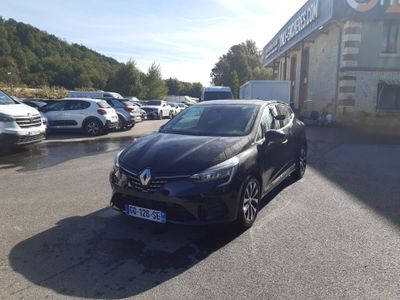 a picture of a black car parked in front of a building