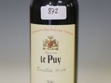 a bottle of wine that is sitting on a table