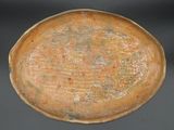 a brown plate that has a brown design on it