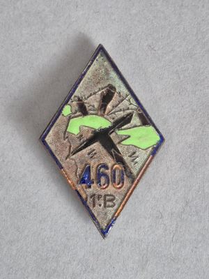 une photo d'un pin's représentant un avion