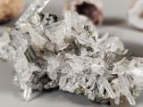 some crystals are sitting on top of a pile of rocks