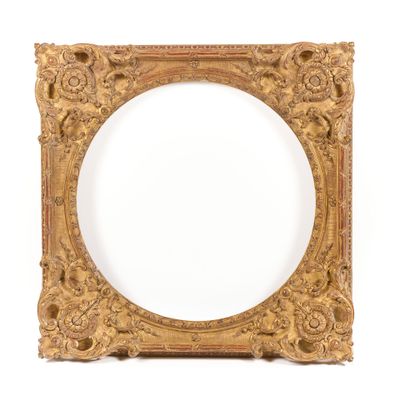 an old gold frame with ornate carvings and a white background