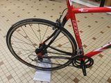 a bike that is sitting on a stand in a room