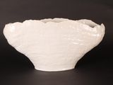 white bowl on black background with black background