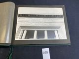 a book with a picture of a building on it