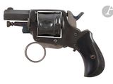 an old revolver with a metal barrel and a black handle