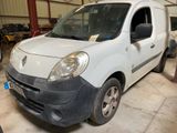 a white van that is parked in a garage