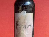 a bottle of wine that is sitting on a table