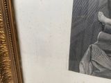a picture of a woman sitting in a chair with her feet on a pillow