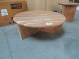 a wooden table and two stools on the floor