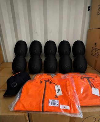 a box with a bunch of protective gear on top of it