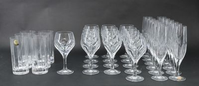 a lot of wine glasses that are sitting on a table
