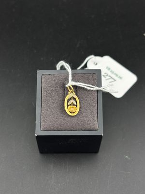 a close up of a small box with a necklace on it