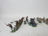the toy soldiers are all lined up and ready to be painted