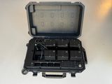 a black case with a bunch of batteries inside of it