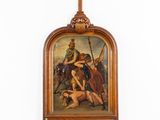 painting of a cross hanging on a wall above a painting of a man on a horse