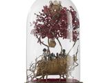 a glass dome with a tree inside of it