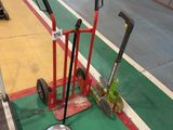 a hand truck with a hand truck on the side of the road
