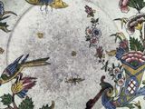 an image of a decorative plate with birds and flowers on it
