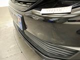 a close up of a car with a sticker on the front of it