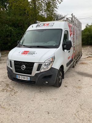 a delivery truck that is parked in a parking lot