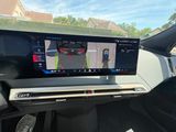 a view of a car ' s dashboard with a camera mounted on the dash