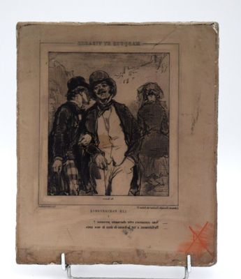 un vieux livre sur lequel figure le dessin d'un homme et d'une femme