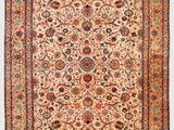 un ancien tapis persan à motif floral