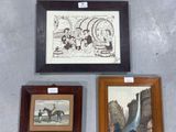 three framed pictures on a wall of various styles and sizes