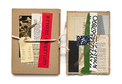 an image of a small book with a piece of paper on top of it