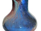 a glass vase with a blue and red design on it
