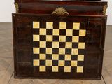 a wooden box with a checkerboard pattern on it