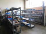 a room with a lot of shelves and shelves with items on them