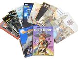 un grand nombre de livres posés sur une table