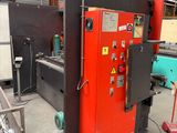 a machine that is sitting inside of a building