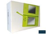 a green nintendo wii game console in a white box