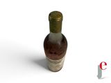 a bottle of liquid that is sitting on a white surface