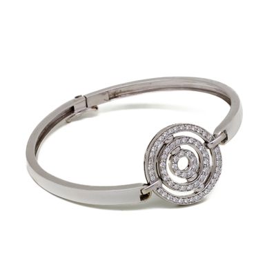 a close up of a diamond bracelet on a white background