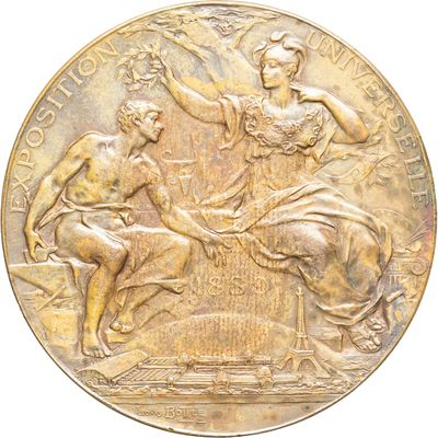 an image of a gold medal with a woman and a man on it