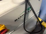 a gas pump with a hose attached to it