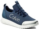 a close up of a blue and white sneakers with the word calvin on it