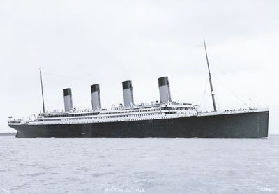 a black and white photo of a large boat in the water