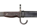 a close up of a knife on a white background with a hook