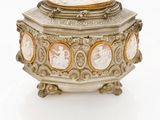 silver and gold plated box with cameo cameos on the lid