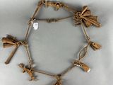 a close up of a gold bracelet with charms on it