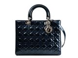 a black handbag with a chain on the handle